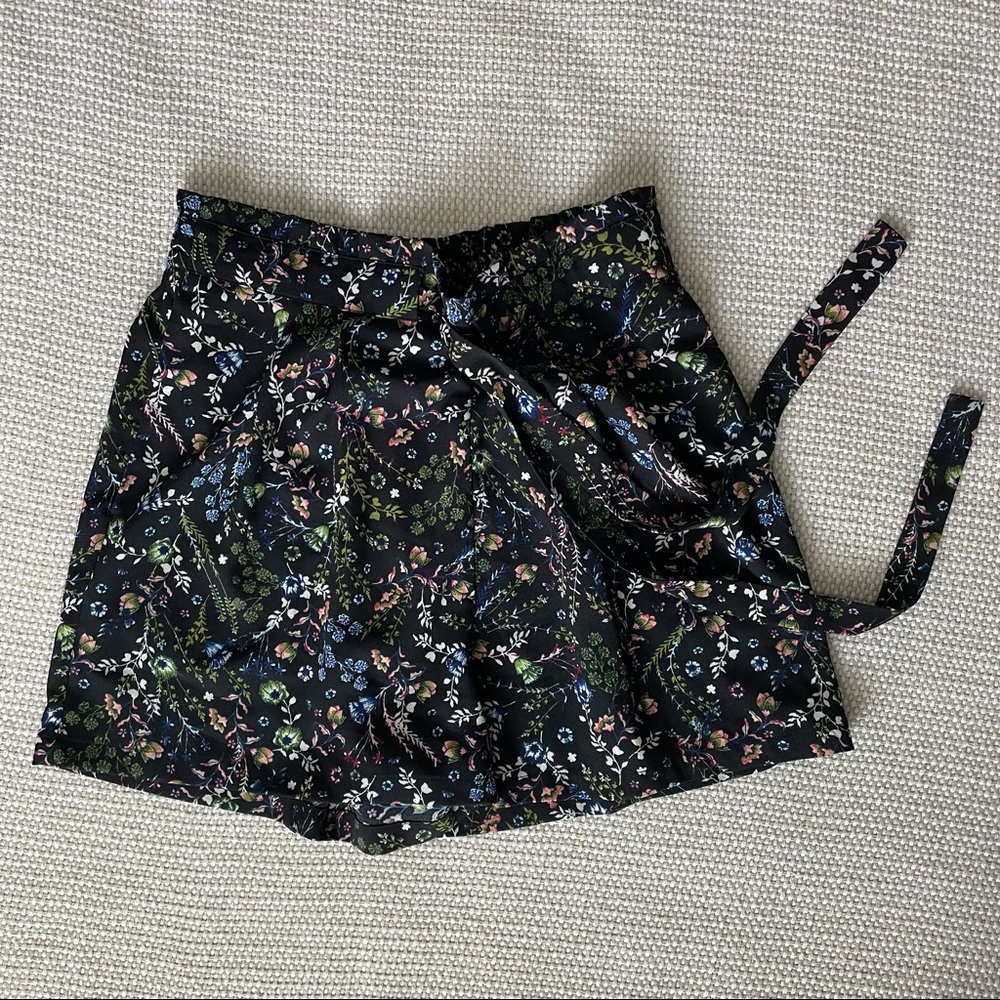 Black floral print paperbag waist shorts with tie belt. NWOT, never worn.